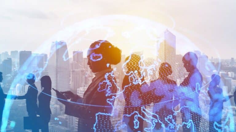 Des professionnels devant une grande ville avec un graphique cyber de la terre en avant-plan